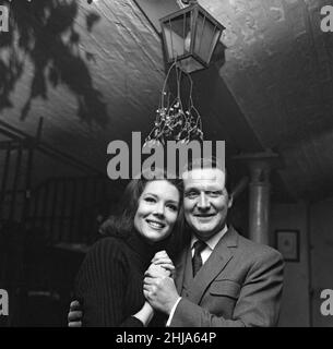 Actress Diana Rigg, 26, the new heroine of the television series 'The Avengers' today met her leading man, Patrick Macnee, at the Cheshire Cheese in Fleet Street. 14th December 1964. Stock Photo