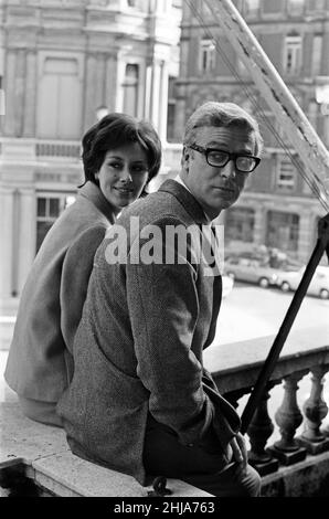 Michael Caine and Sue Lloyd on the set of 'The Ipcress File'. 21st September 1964. Stock Photo