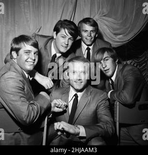 American pop group The Beach Boys at a photocall held at EMI House in Manchester Square.They are back row left to right: Brian Wilson and Al jardine. Front row left to right: Carl Wilson, Mike Love and Dennis Wilson. 2nd November 1964. Stock Photo