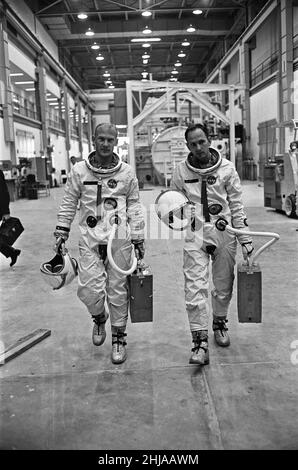 Astronauts Edwin Eugene Buzz Aldrin (Left) and Theodore Cordy Ted Freeman (Right) seen here walking through the training facility at the Johnson Space Centre in Houston, Texas. Where they were training for the Gemini space program. 30th October 1964Astronaut Ted Freeman sadly died in an aircraft accident the day after this image was captured Stock Photo