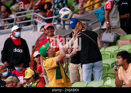 Melbourne, Australia, 27 January, 2022. A Socceroos fan is seen throwing a soccer ball into the crowd during the World Cup Qualifier football match between Australia Socceroos and Vietnam on January 27, 2022 at AAMI Park in Melbourne, Australia. Credit: Dave Hewison/Speed Media/Alamy Live News Stock Photo