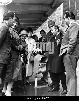 Leo Abse, who held Pontypool for Labour, chatting with some constituents. 15th October 1964. Stock Photo