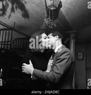 Actress Diana Rigg, 26, the new heroine of the television series 'The Avengers' today met her leading man, Patrick Macnee, at the Cheshire Cheese in Fleet Street. 14th December 1964. Stock Photo