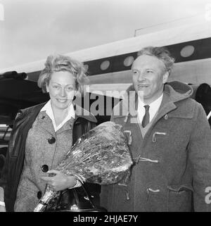 Newly weds, Hugh Cudlipp, Chairman, Daily Mirror Newspapers with wife Jodi Hyland at London Heathrow Airport, 18th March 1963. Stock Photo