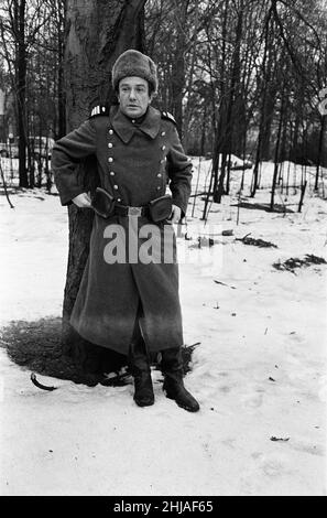 Albert Finney on the set of 'The Victors' at Shepperton Studios. Albert Finney is donating his salary to the actors orphanage. In the film he plays the part of a Russian soldier in Berlin and is going to learn Russian. 7th January 1963. Stock Photo