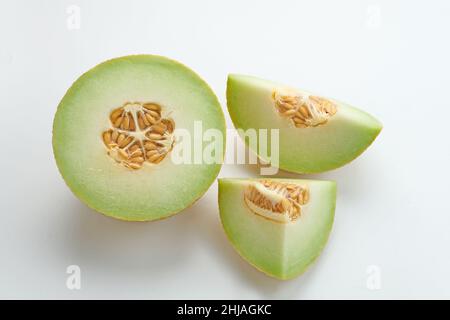 Sliced of cantaloupe melon isolated on white background. Stock Photo