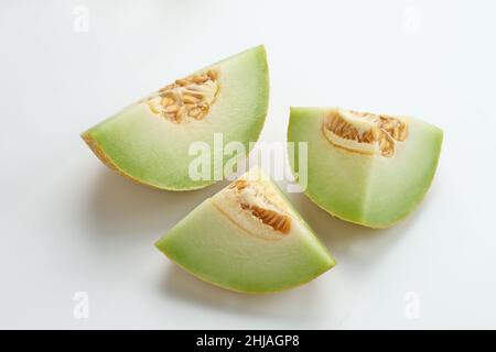 Sliced of cantaloupe melon isolated on white background. Stock Photo