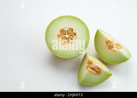Sliced of cantaloupe melon isolated on white background. Stock Photo