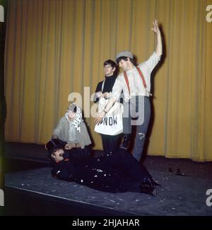 The Beatles in costume seen here rehearsing on stage for their Christmas Show at the Astoria Finsbury Park 23rd December 1963 *** Local Caption *** Paul McCartneyRingo Starr George Harrison John Lennon Stock Photo