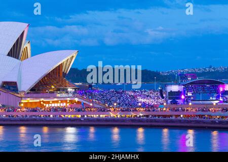 The crowded forecourt of Sydney Opera House during the Australia Day concert on 26 January 2022 in Sydney, Australia. Stock Photo