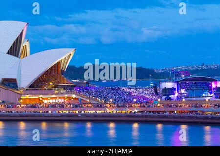 The crowded forecourt of Sydney Opera House during the Australia Day concert on 26 January 2022 in Sydney, Australia. Stock Photo