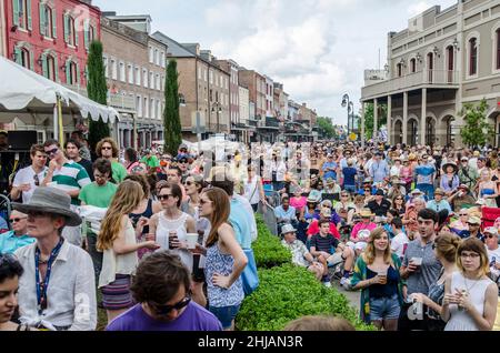 NEW ORLEANS, LA, USA - APRIL 13, 2014: Crowd Gathered at Decatur Street Stage at French Quarter Festival Stock Photo