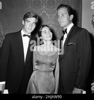 The world premier of  'The Main Attraction' at the Plaza, Piccadilly, which stars Pat Boone and Nancy Kwan. Pictured, guest, Nancy Kwan and Pat Boone and  at premier. 25th October 1962. Stock Photo