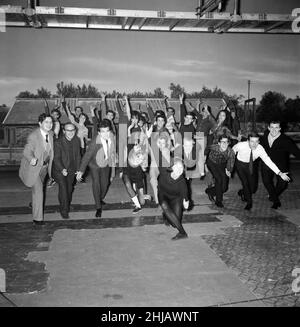 Cliff Richard rehearsing a dance routine for his new film. Cliff Richard and his leading lady Susan Hampshire began rehearsing for the big dance routines in their new musical film 'Wonderful Life'. Also present are other members of the cast. Pictured, Gillian Lynne, the choreographer, leads the whole company in some dance routines.  6th November 1963. Stock Photo
