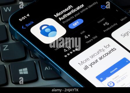Microsoft Authenticator app is seen in the App Store on an iPhone. It helps users sign in to all online accounts using multi-factor authentication... Stock Photo
