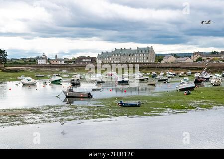 Barfleur in Normandy, the harbor, with traditional houses in background Stock Photo