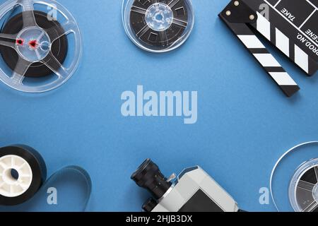 Top view of arrangement cinema elements on a blue background with copy space Stock Photo