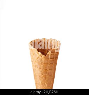Empty wafer ice cream cone on isolated white background. Stock Photo
