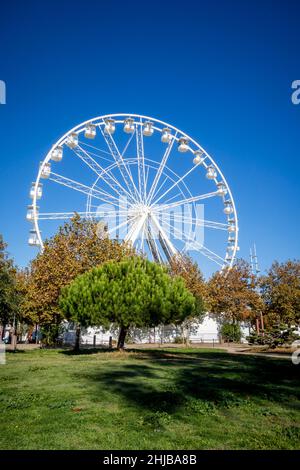 Ferris wheel in La Rochelle old harbor, France Stock Photo