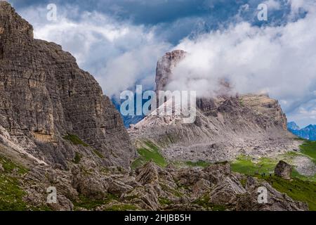 The summit of Becco di Mezzodì, partly covered in clouds, seen from Forcella di Giau. Stock Photo