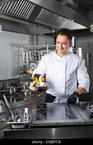 chef preparing ludo in an elite restaurant Stock Photo