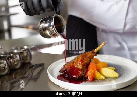 chef preparing ludo in an elite restaurant Stock Photo