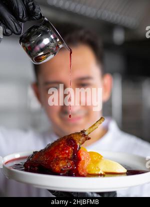 chef preparing ludo in an elite restaurant Stock Photo