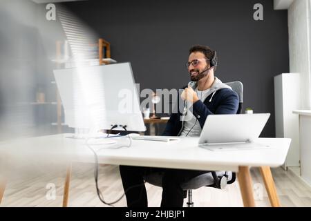 Virtual Business Presentation Or Videoconferencing On Computer Stock Photo