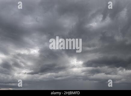 Dramatic Cloudscape Area. Dark gray clouds. Storm clouds background Stock Photo