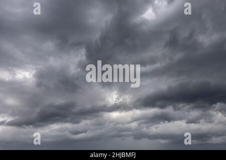 Dramatic Cloudscape Area. Dark gray clouds. Storm clouds background Stock Photo