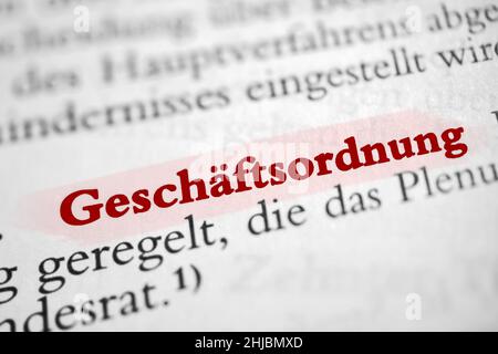 Closeup on the highlighted German word 'Geschaftsordnung' in a newspaper. Stock Photo