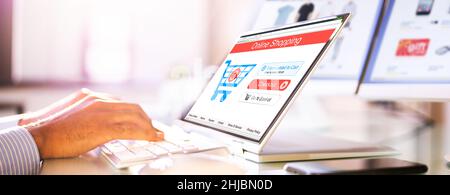 Online Ecommerce Shopping On Convertible Convertible Or Tablet Stock Photo