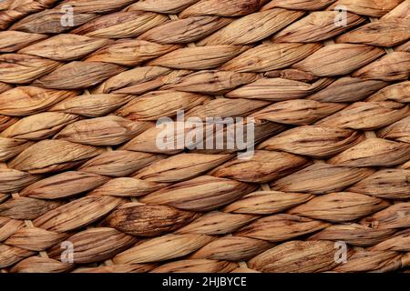 Texture of a wicker surface from banana palm branches. Stock Photo
