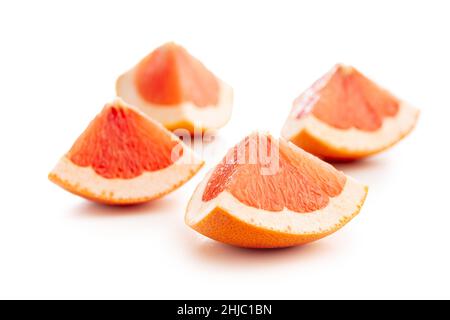 Sliced citrus fruit. Chopped fresh grapefruit.isolated on a white background. Stock Photo