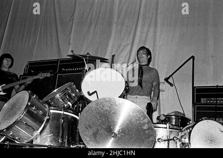 Keith Moon (drummer) wrecks his drum set-up watched by John Entwistle as they end a performance with The Who in the Anson Rooms, Bristol University Students’ Union, 7 December 1968 Stock Photo