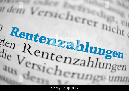 Closeup on the highlighted German word 'Rentenzahlungen' in a newspaper. Stock Photo