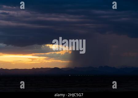 Monsoon storm with rain over Phoenix near New River, Arizona, United States. Stock Photo