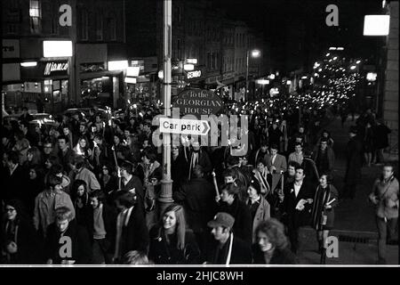 A torchlight procession of students raising money for charity snakes up Park Street during Bristol University Rag Week on 4 March 1968.  Student newspaper Nonesuch reported 1,500 students took part with 500 torches sold.  The route was from The Centre up to the Victoria Rooms for the Rag Queen crowning in advance of a weekend Rag parade of floats through the city, which raised thousands of pounds for that year’s appeal.. Stock Photo