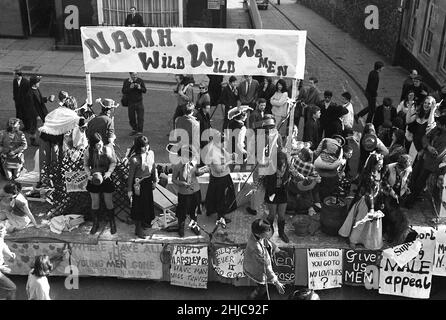 Bristol University’s 1969 Rag procession fills the streets with fund-raisers and floats as it brings part of the city to a temporary halt.  The parade started from Clifton Down station car park at 2.30 pm on 8 March and wound its way past the Victoria Rooms and the Wills building on down Park Street round to Baldwin Street then on through Broadmead before returning along Lower and Upper Maudlin Street and Park Row.  Thousands of spectators lined the streets and thousands of pounds were raised for charity. Stock Photo