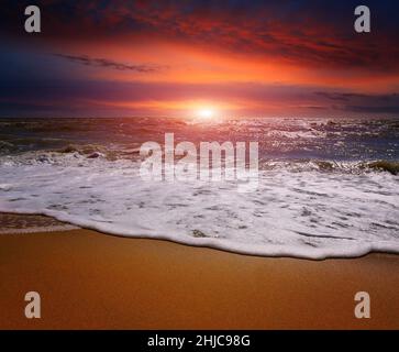 Majestic sunset scene over stormy sea Stock Photo