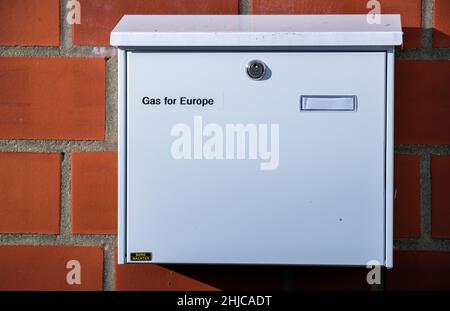 Schwerin, Germany. 28th Jan, 2022. A mailbox with the address inscription 'Gas for Europe' hangs on an office building in the prefabricated construction area of the state capital. The subsidiary required for certification of the Nord Stream 2 gas pipeline was founded a few days ago. The gas transport company Gas for Europe GmbH will own and operate the German part of the Nord Stream 2 pipeline. Credit: Jens Büttner/dpa-Zentralbild/dpa/Alamy Live News