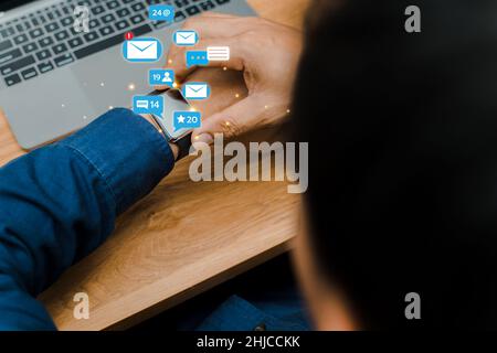 People using social media marketing ideas on smart watches. with notification icons like, messages, comments and stars Stock Photo