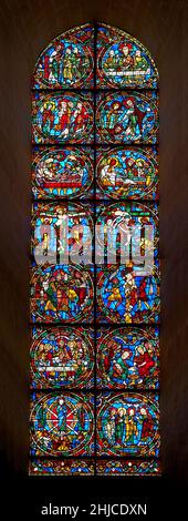 Medieval stained glass Window of the Gothic Cathedral of Chartres, France - dedicated to the Passion. The Passion of Christ is the story of Jesus Chri Stock Photo