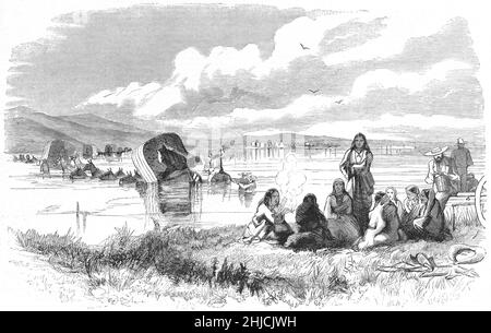 A wagon train crossing the Platte River during the Colorado Gold Rush, with Native American woman sitting on the riverbank. Illustration by Albert Bierstadt (1830-1902). Harper's Weekly, August 13, 1859. The Pike's Peak Gold Rush, later known as the Colorado Gold Rush, occurred in Kansas Territory and Nebraska Territory from mid-1858 to early-1861. Stock Photo