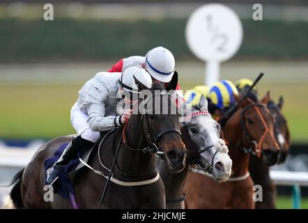 Andrew Breslin riding Enfranchise (left) on their way to winning the Play 4 To Win At Betway Handicap at Lingfield Park Racecourse, Surrey. Picture date: Friday January 28, 2022. Stock Photo