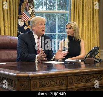 Donald Trump, 45th President of the United States, and his daughter, Ivanka Trump, in the Oval Office of the White House, April 24, 2017. Donald Trump (born June 14, 1946), a businessman and television personality, ran for president in 2016 as a Republican against Democratic candidate Hillary Clinton. He won the general election on November 8, 2016 and was inaugurated on January 20, 2017. His daughter Ivanka Trump (born October 30, 1981) is a businesswoman and former model. She currently serves as Assistant to the President. Stock Photo