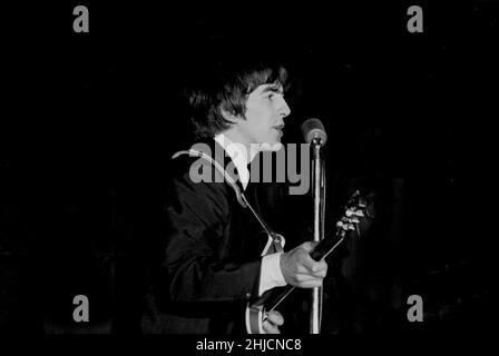 Beatles member, George Harrison, during a concert in Forest Hills, Queens on August 29th, 1964. Stock Photo