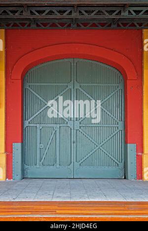 Warehouse gate in the harbor pier Stock Photo