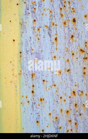 Creative background rusty metal with cracks and scratches, casually painted white, selective focus Stock Photo
