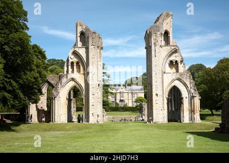 Tourists in the ruins of Glastonbury Abbey Stock Photo